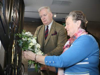 Chair of the Board Colonel (Retired) Don Bigger with invited guest Hannah Renwick at the NIWM gallery.