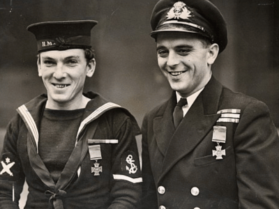 Leading Seaman James Magennis and Lieutenant Ian Fraser with the VCs.