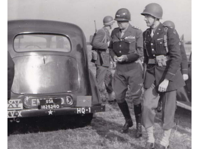 General Patton escorted by Colonel Robert P. Bell from the 10th Infantry Regiment, 5th Infantry Division.