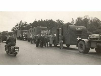 Eisenhower's trailers waiting to depart Langford Lodge, with Russell centre in the group.