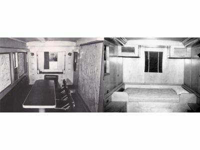 Interior of the command trailer looking towards the rear and the bed in an accommodation trailer.